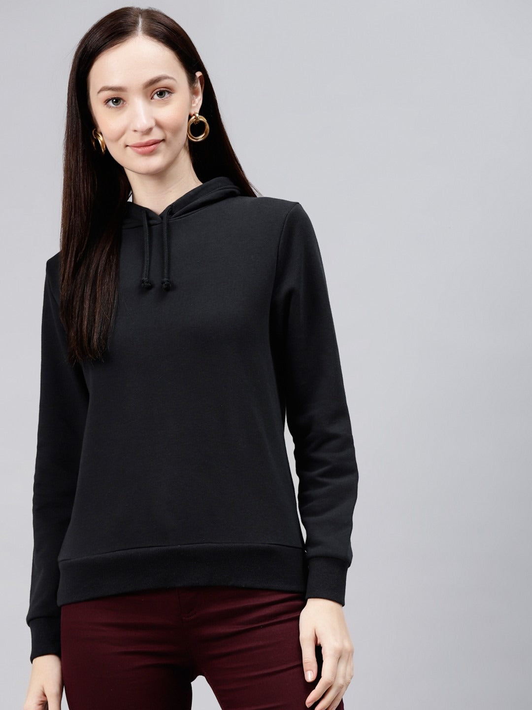Women Black Hooded Sweatshirt — Classic Black Hoodie for Women | DOCACCA Pakistan