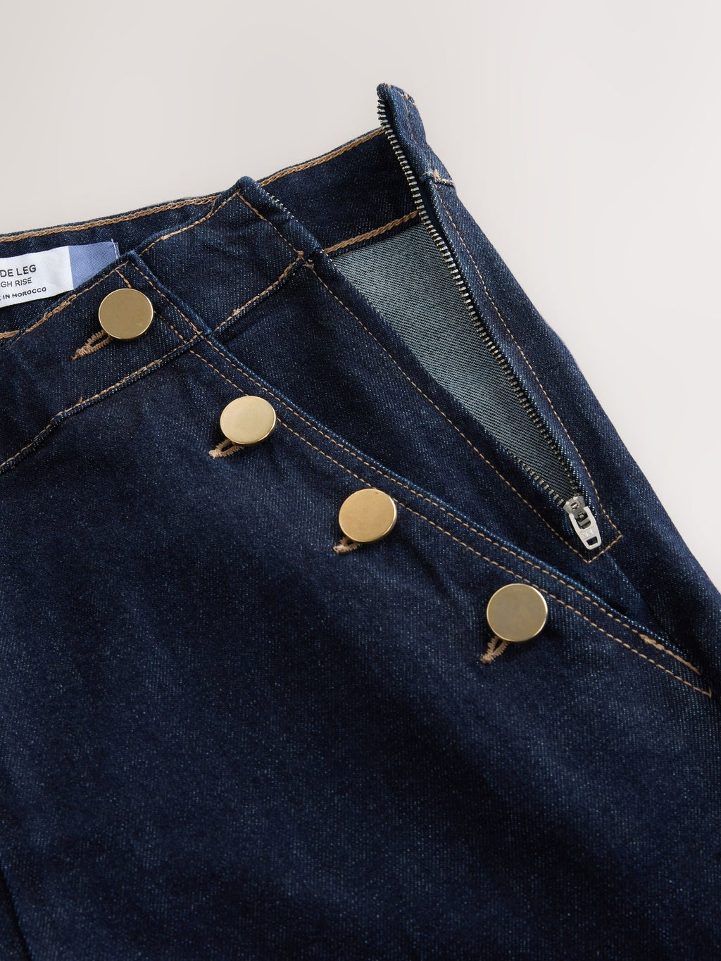 Women Denim Rinse Gold Button Front Wide Leg Jeans – Stylish High Rise Trend in Pakistan