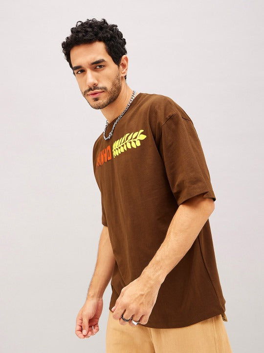 Unisex Brown Typography Printed Pure Cotton Oversized T-Shirt – Trendy Streetwear in Pakistan | DOCACCA