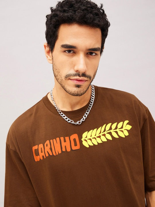 Unisex Brown Typography Printed Pure Cotton Oversized T-Shirt – Trendy Streetwear in Pakistan | DOCACCA