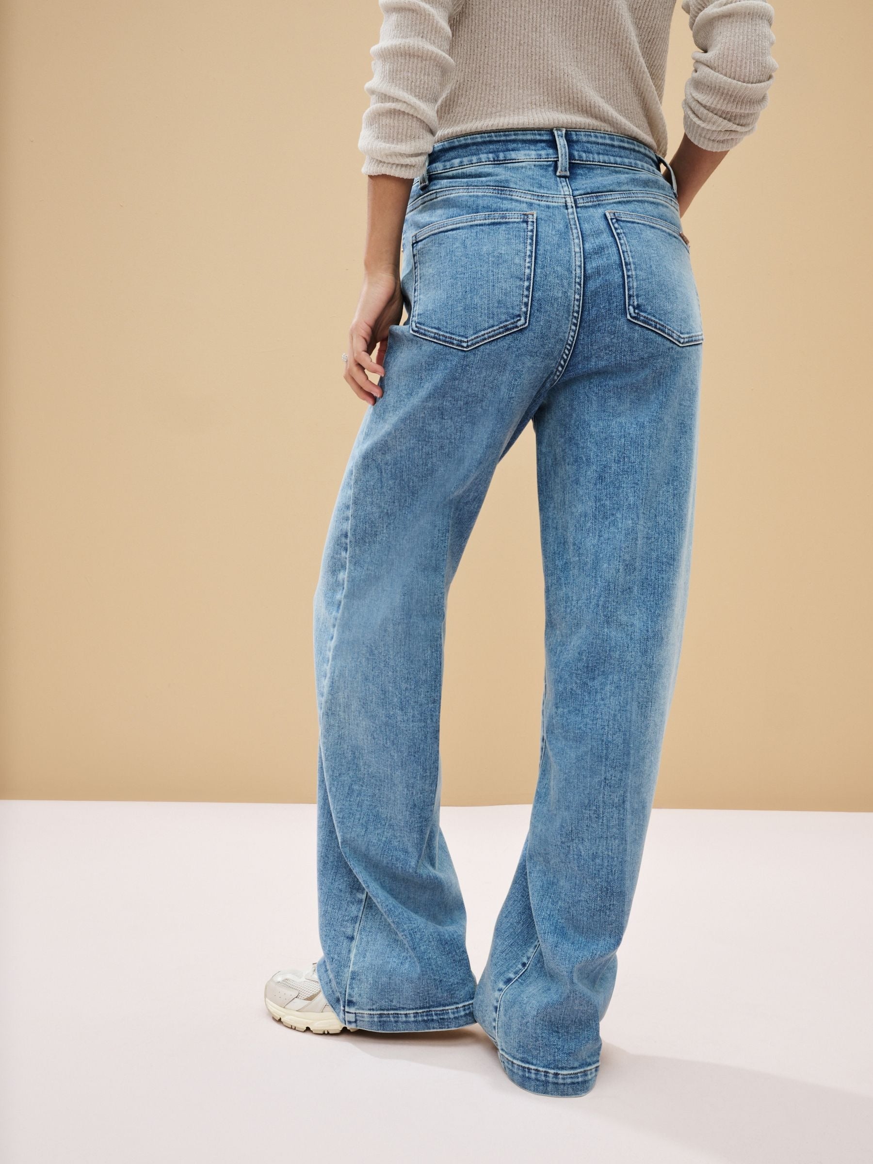 Women Mid Blue Wide Leg Jeans – Trendy High Waist Denim Pants for Women in Pakistan | DOCACCA