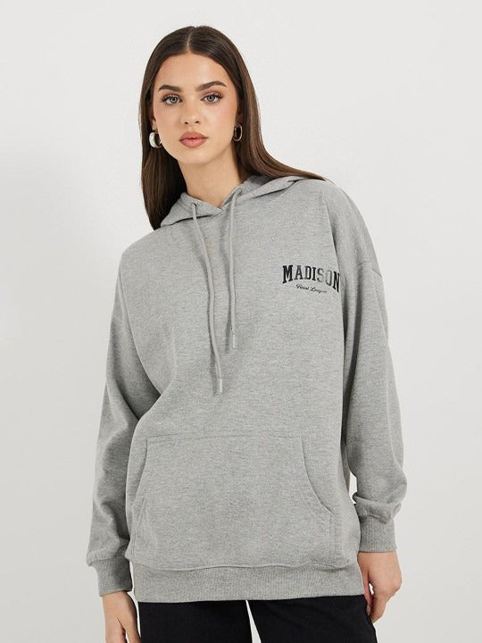 Women’s Longline Slogan Print Pullover Hoodie — Regular Fit with Kangaroo Pocket | DOCACCA Pakistan