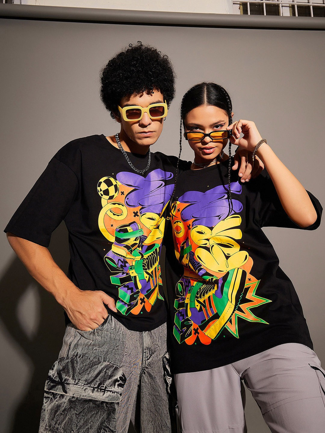 Unisex Black Graphic Printed Pure Cotton Oversized T-shirt – Trendy Streetwear for Men & Women in Pakistan | DOCACCA