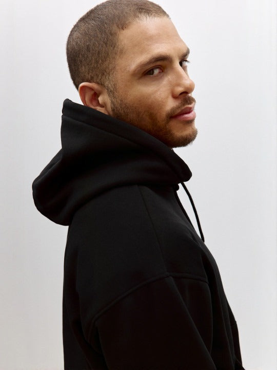 Men Black Relaxed Fit Hoodie – Comfortable Streetwear Style in Pakistan | DOCACCA